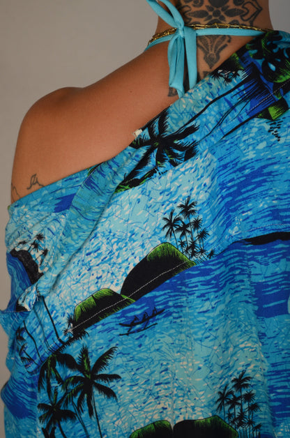 camicia hawaiana con disegni palme